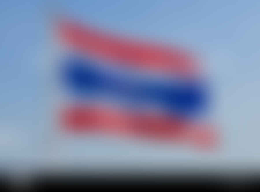 Close-up view of the vibrant colors of the Thailand flag