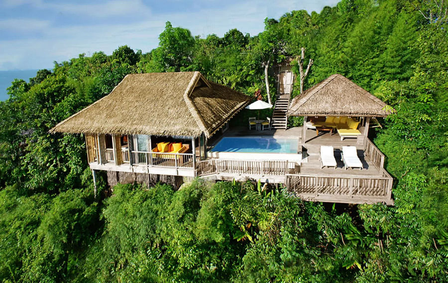 Panoramic view of Six Senses Yao Noi resort showcasing its lush surroundings and stylish accommodations